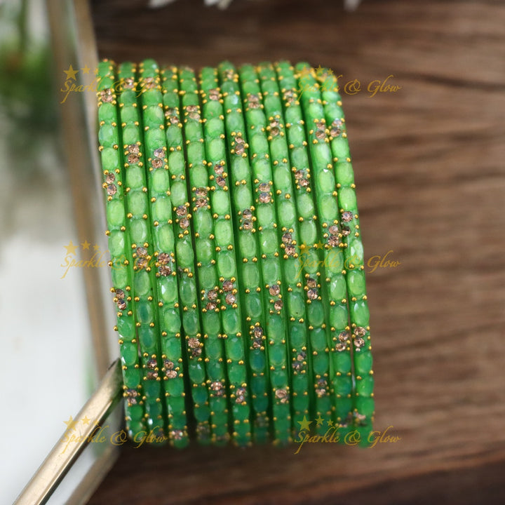 Exquisite White Glass Bangles with Gold Highlights