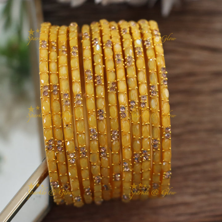 Exquisite White Glass Bangles with Gold Highlights