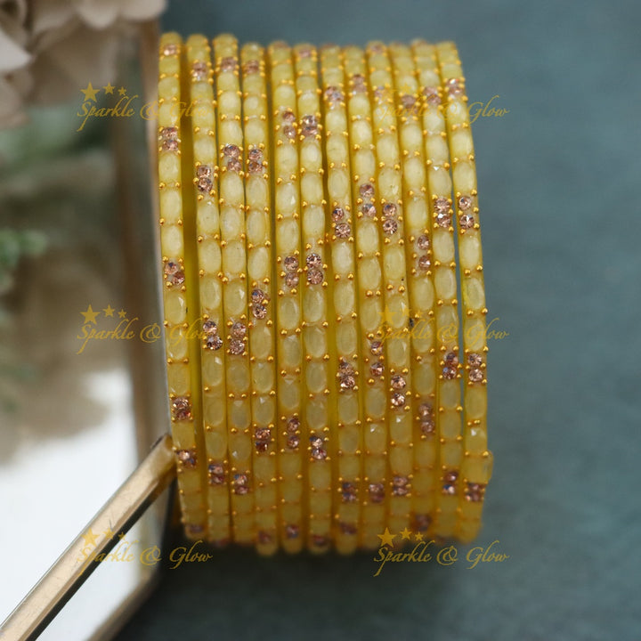 Exquisite White Glass Bangles with Gold Highlights