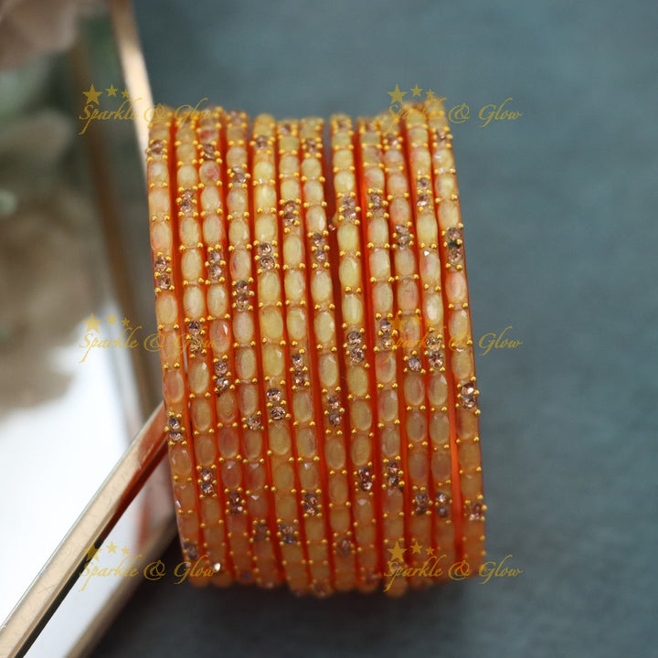 Exquisite White Glass Bangles with Gold Highlights