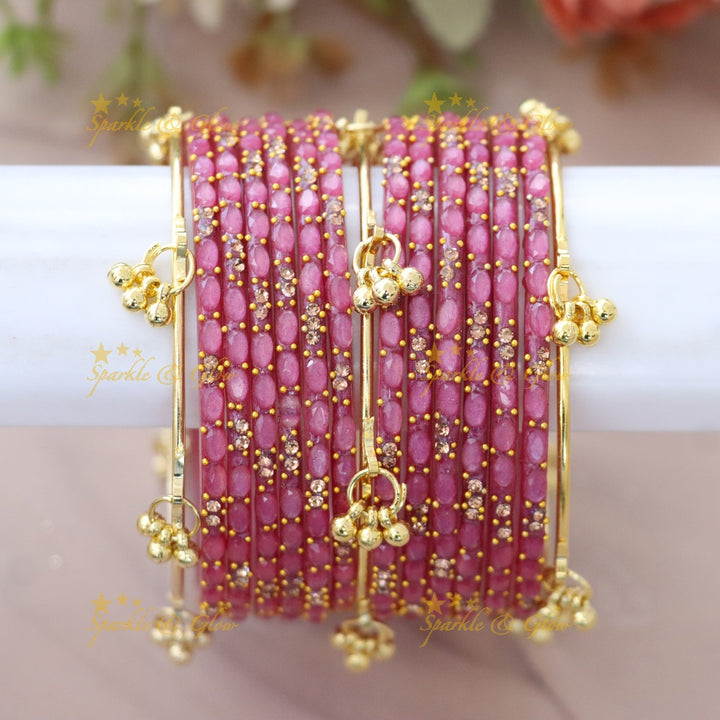 Elegant Gold-Plated Raindrop Bangles - Sparkle & Glow