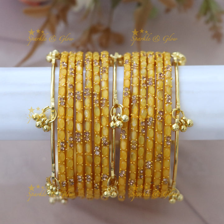 Elegant Gold-Plated Raindrop Bangles - Sparkle & Glow