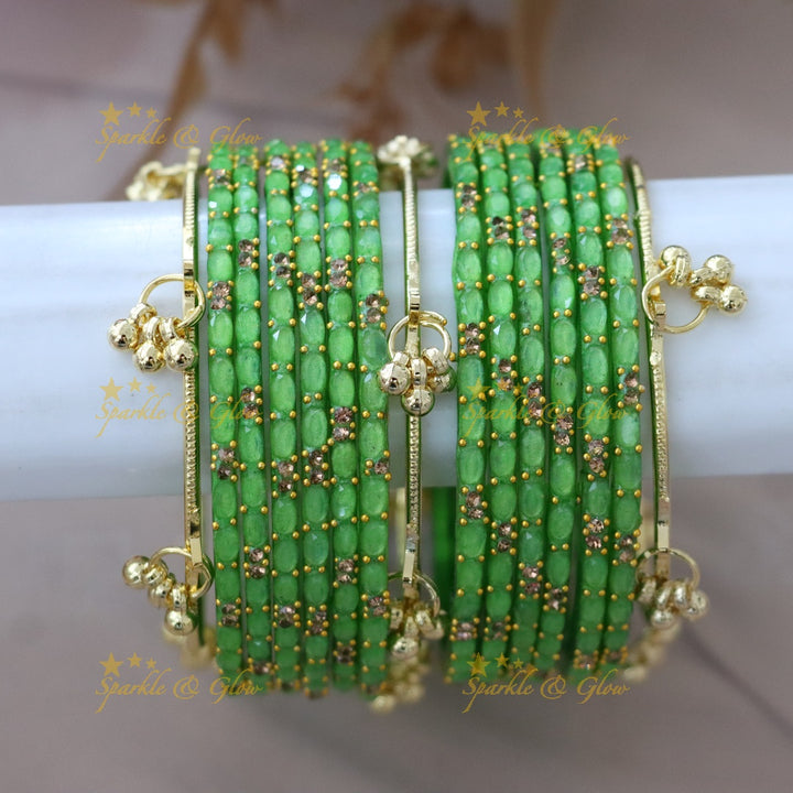 Elegant Gold-Plated Raindrop Bangles - Sparkle & Glow