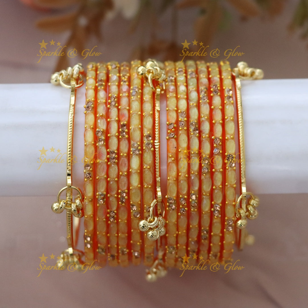 Elegant Gold-Plated Raindrop Bangles - Sparkle & Glow