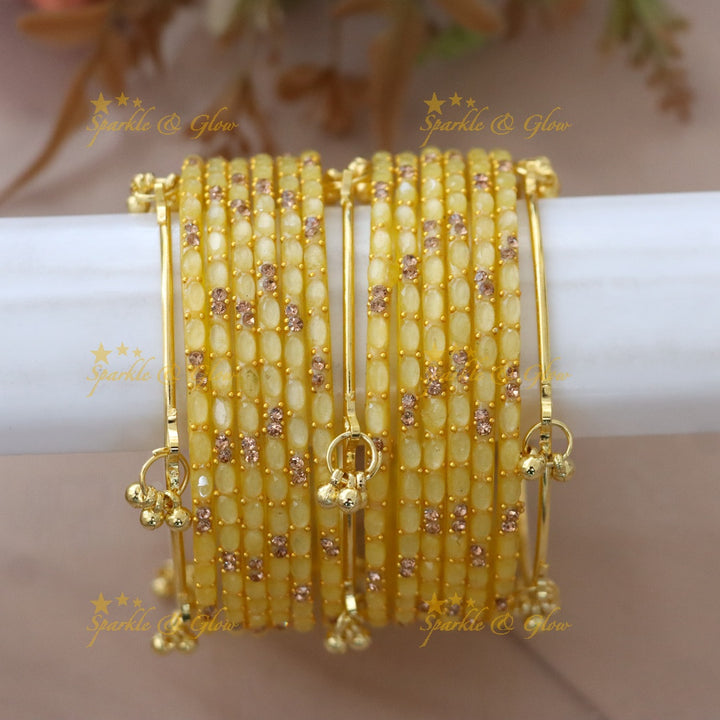 Elegant Gold-Plated Raindrop Bangles - Sparkle & Glow