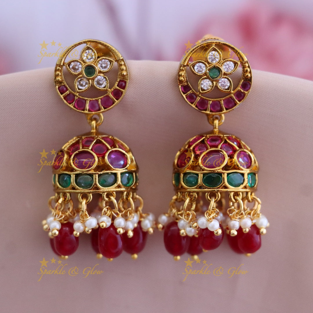 Elegant Gold Jhumkas with Gemstones for Weddings
