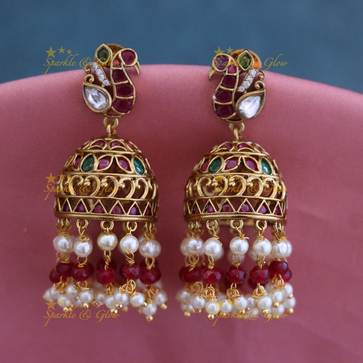 Luxurious Gold Jhumka Earrings with Pearls & Gems