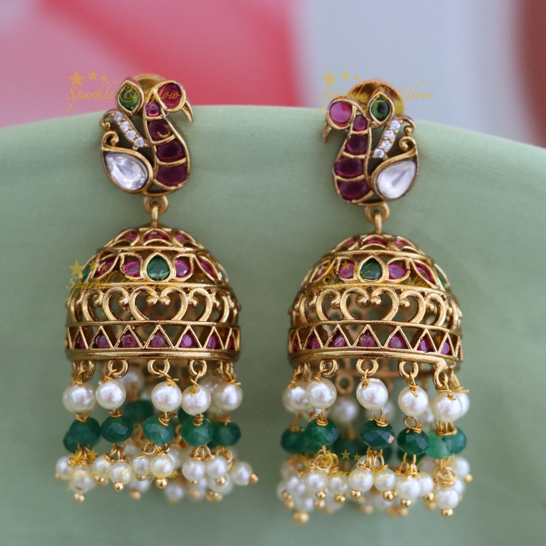 Luxurious Gold Jhumka Earrings with Pearls & Gems