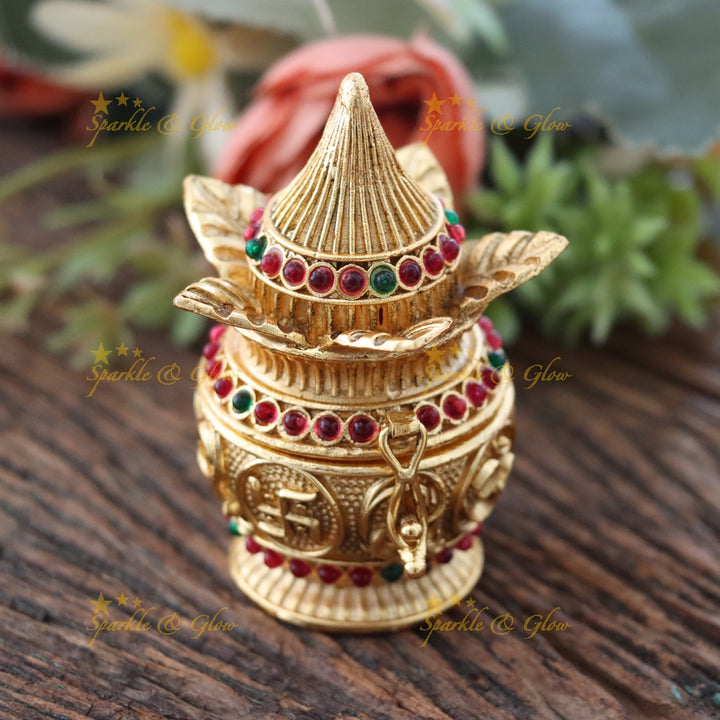 Ornate Gold Kumkum Box with Coconut Leaf Design