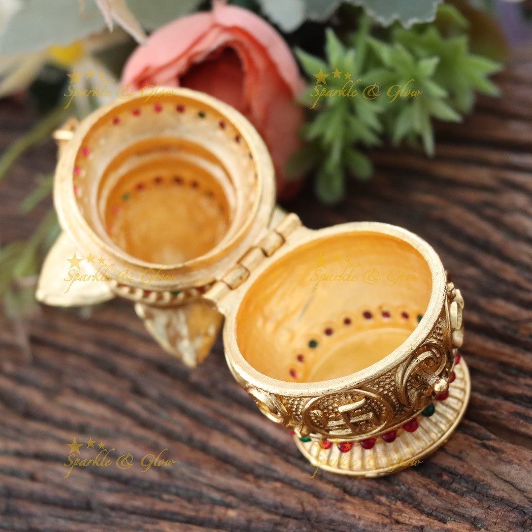 Ornate Gold Kumkum Box with Coconut Leaf Design