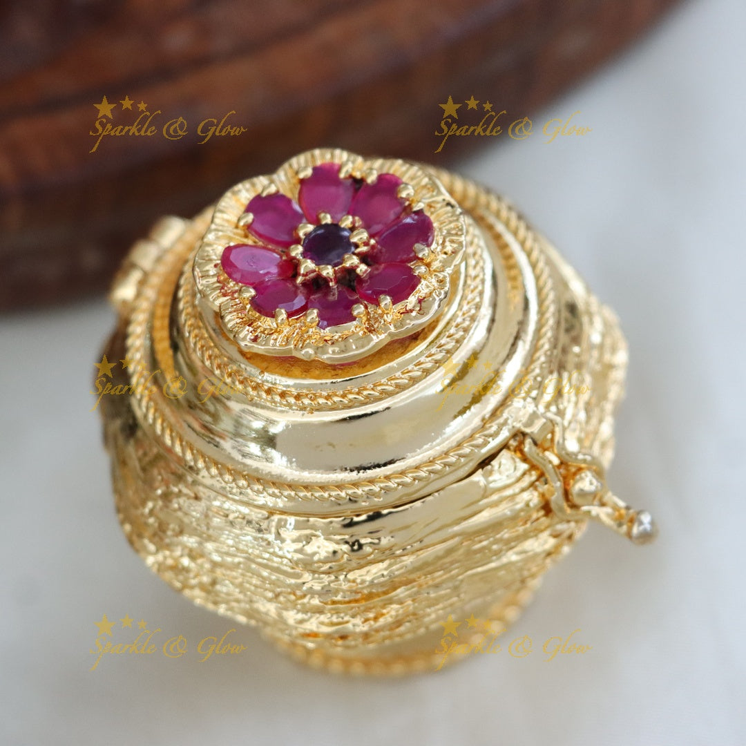Traditional Gold Kumkum Box with Floral Design