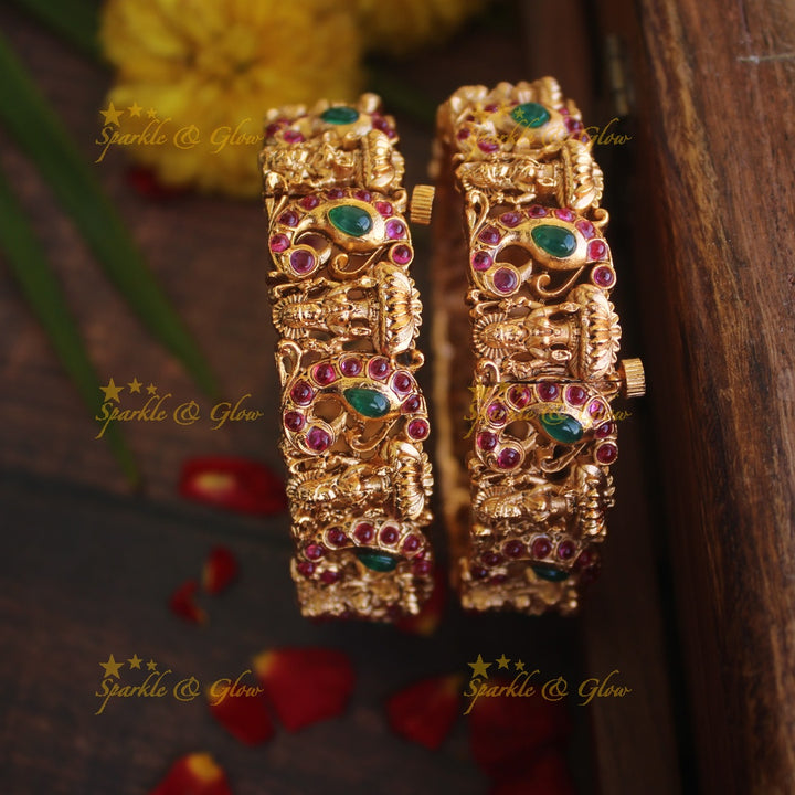 Gold alike peacock  and Lakshmi carved screw bangles