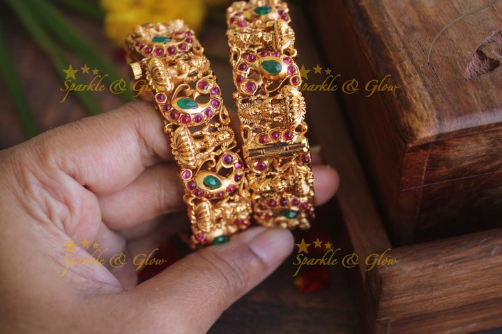 Gold alike peacock  and Lakshmi carved screw bangles