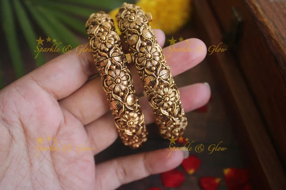 Gold alike antique floral intricate carved kada type screw bangles - Sparkle and Glow