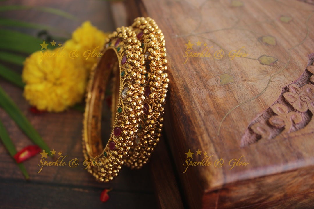 Gold alike antique kada type ghungroo bangles