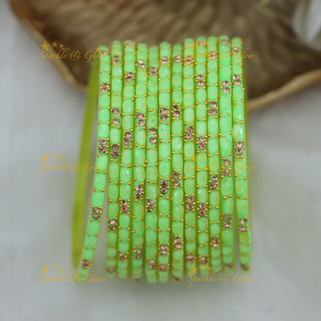 Exquisite White Glass Bangles with Gold Highlights