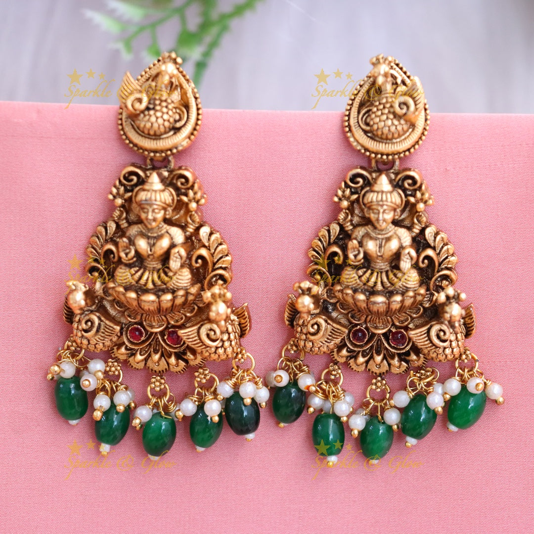 Exquisite Gold Temple Earrings with Gemstone Charms