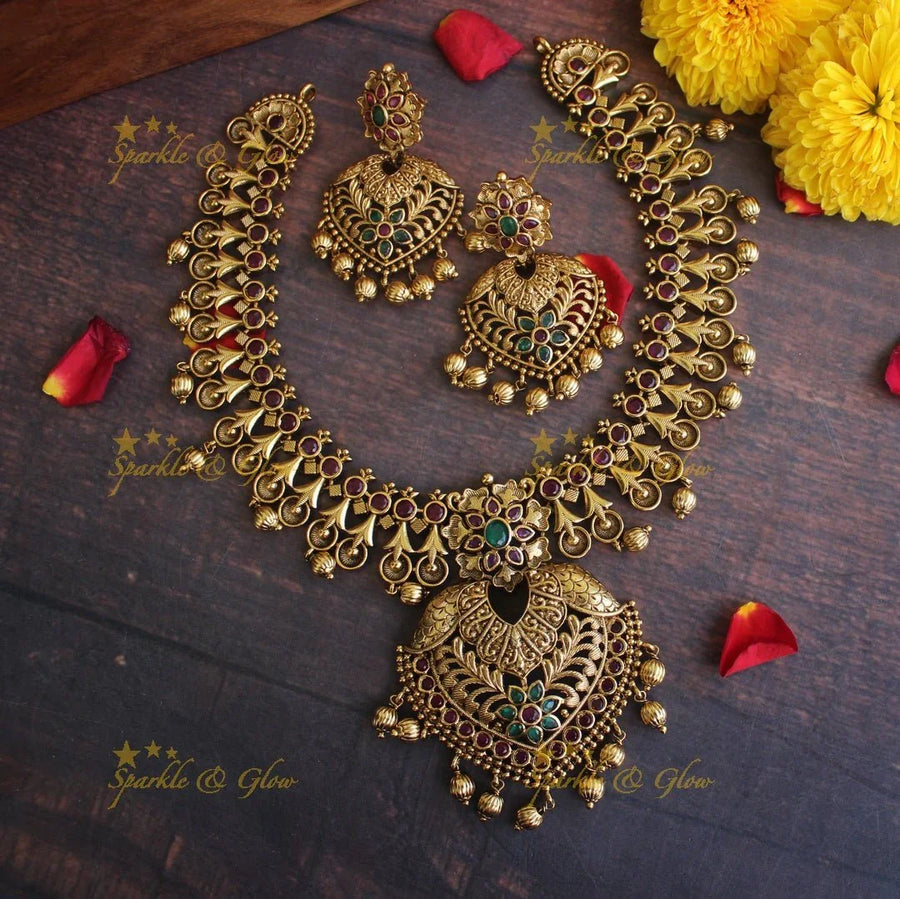 Gold alike Antique polished intricate non idol short necklace - Sparkle and Glow