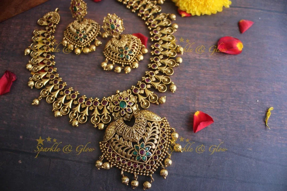 Gold alike Antique polished intricate non idol short necklace - Sparkle and Glow