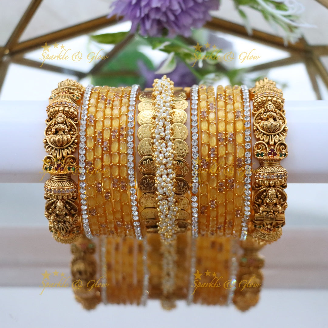 Exquisite Lakshmi Coin Bangle Set with Pink Gems