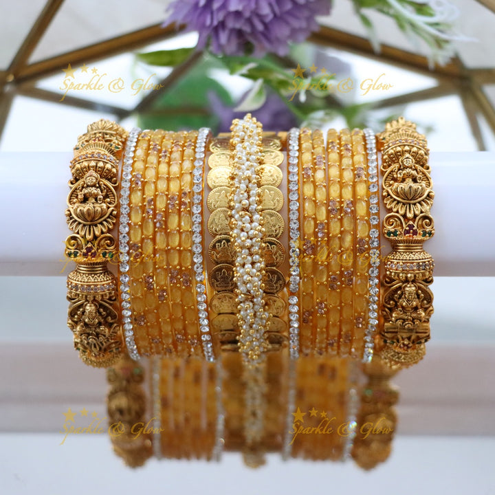 Exquisite Lakshmi Coin Bangle Set with Pink Gems