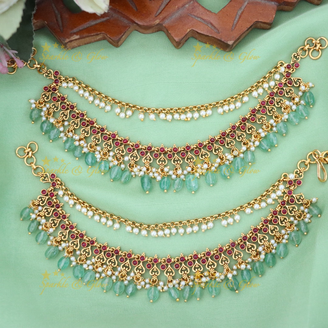 Elegant Gold Earrings with Pearl Embellishments