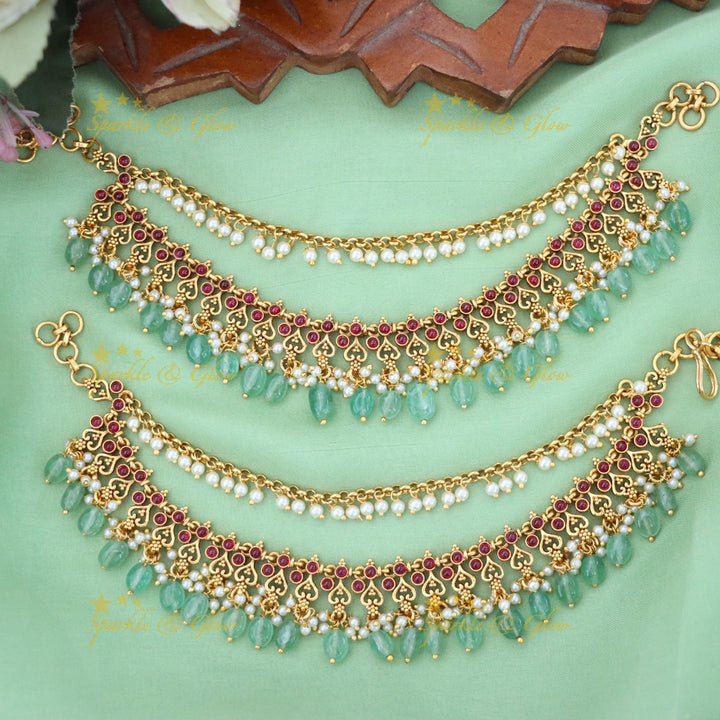 Elegant Gold Earrings with Pearl Embellishments