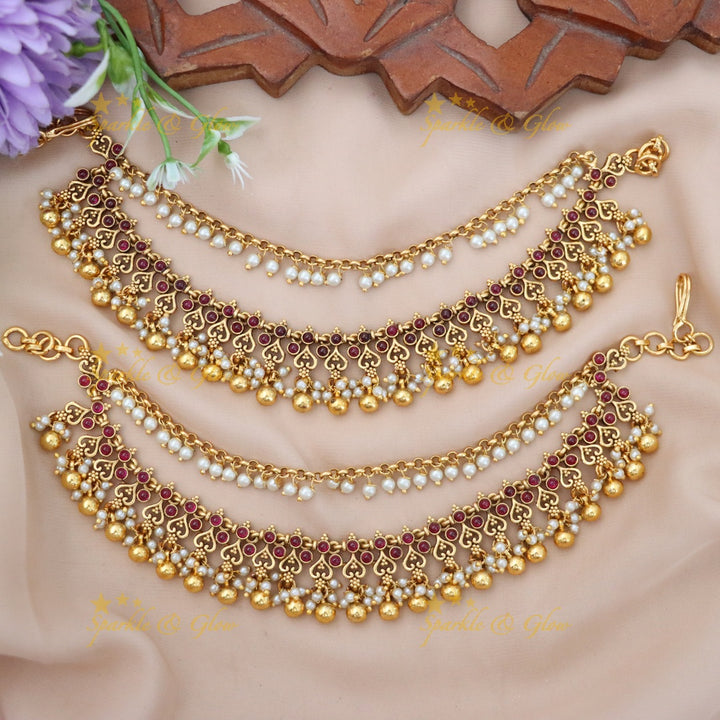 Elegant Gold Earrings with Pearl Embellishments