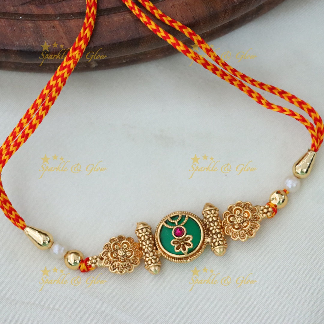 Gold Rakhi Bracelet for a Touch of Festive Elegance