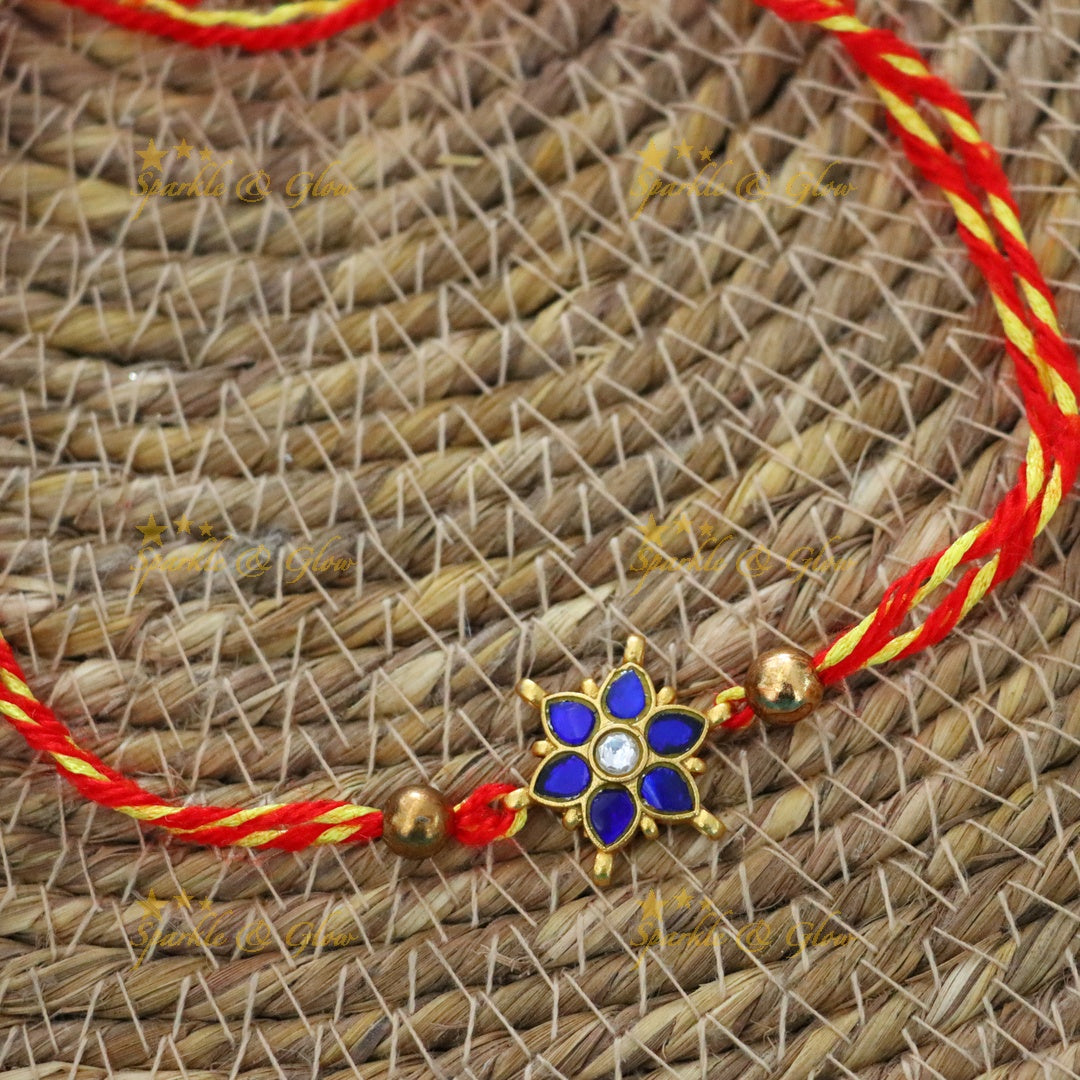 Exquisite Jadau Kundan Rakhi with Floral Motif – Sparkle & Glow