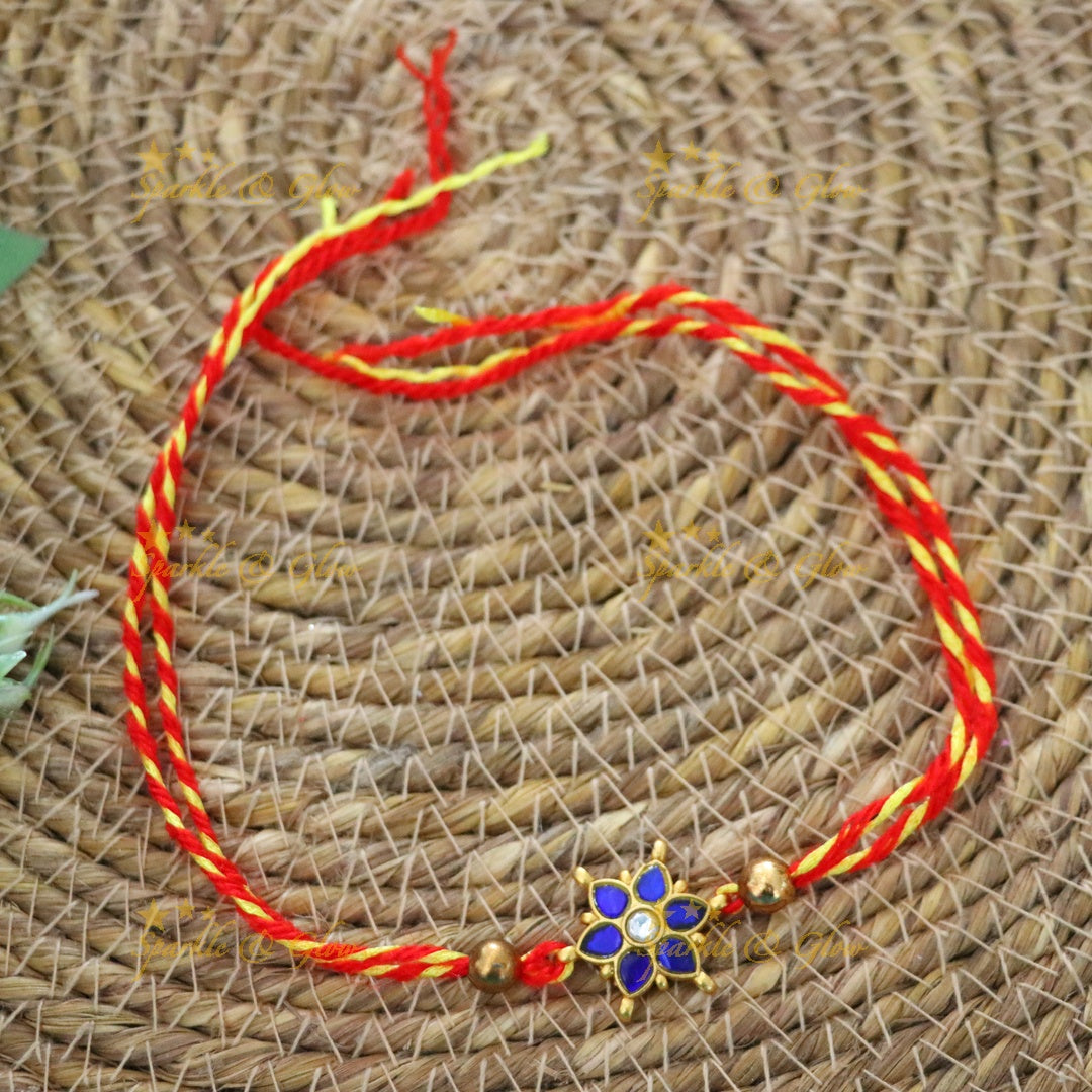 Exquisite Jadau Kundan Rakhi with Floral Motif – Sparkle & Glow