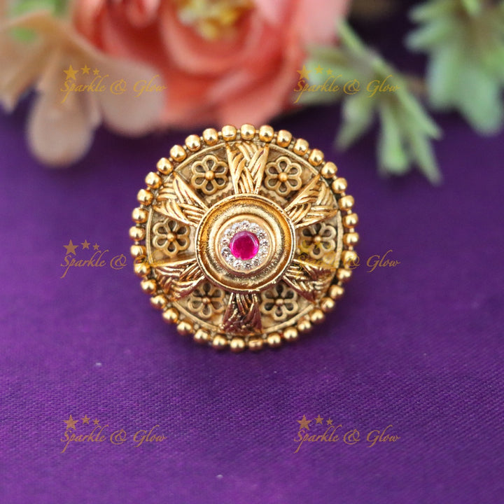 Elegant Gold Floral Finger Ring with Ruby Accent