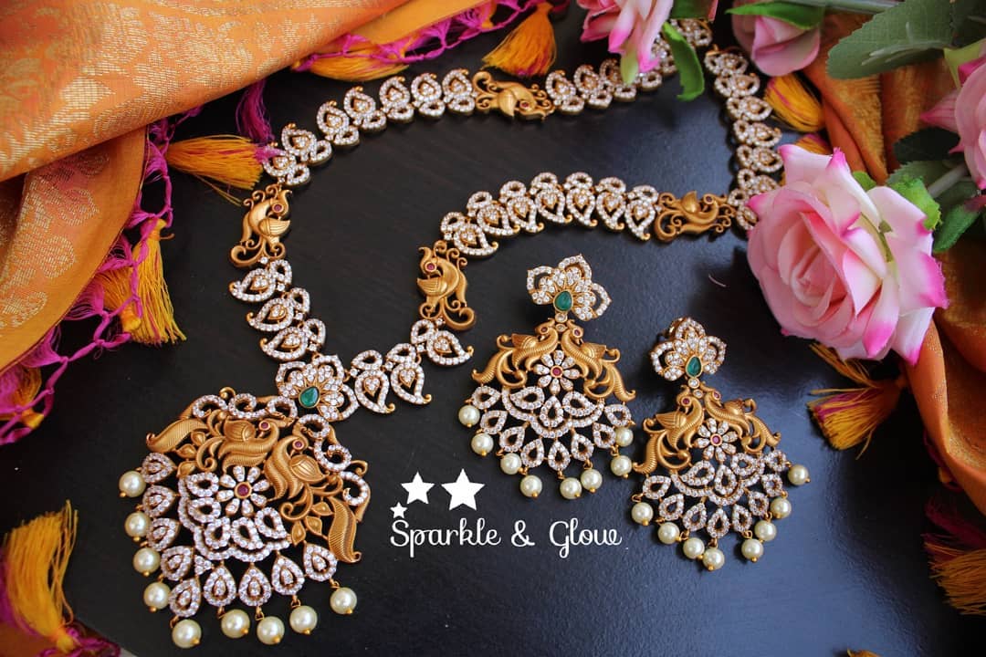 AD Stone Matte mango haram with peacock carved pendent