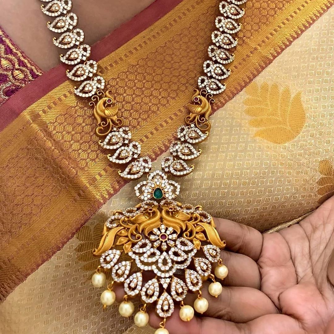 AD Stone Matte mango haram with peacock carved pendent