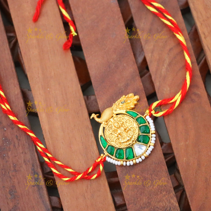Exquisite Gold-Plated Peacock Rakhi for Festive Elegance