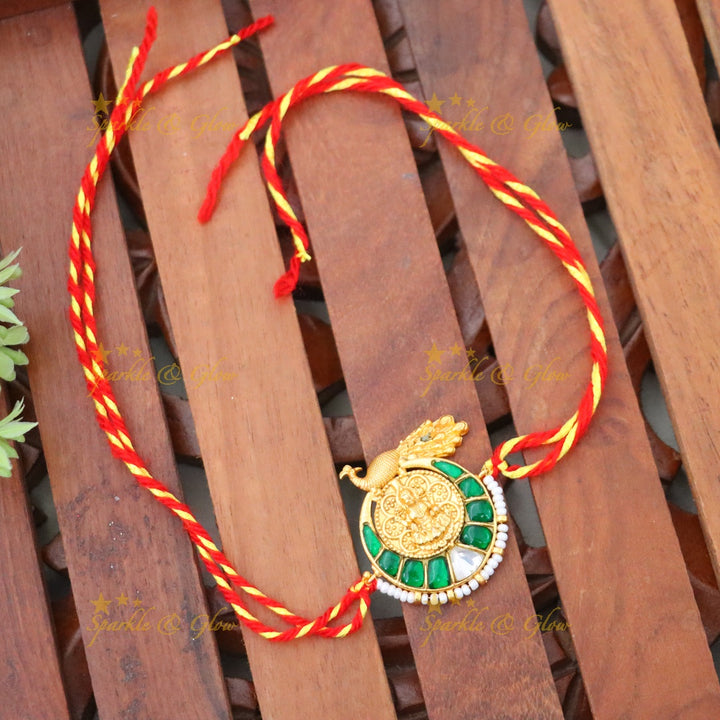 Exquisite Gold-Plated Peacock Rakhi for Festive Elegance