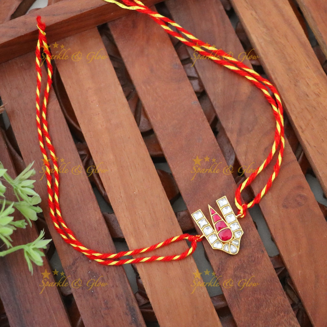 Exquisite Gold Rakhi with Traditional Design