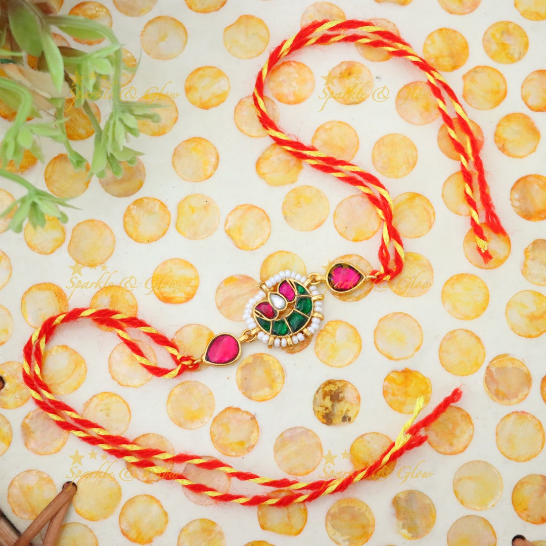Exquisite Rakhi with Elegant Gemstone Design