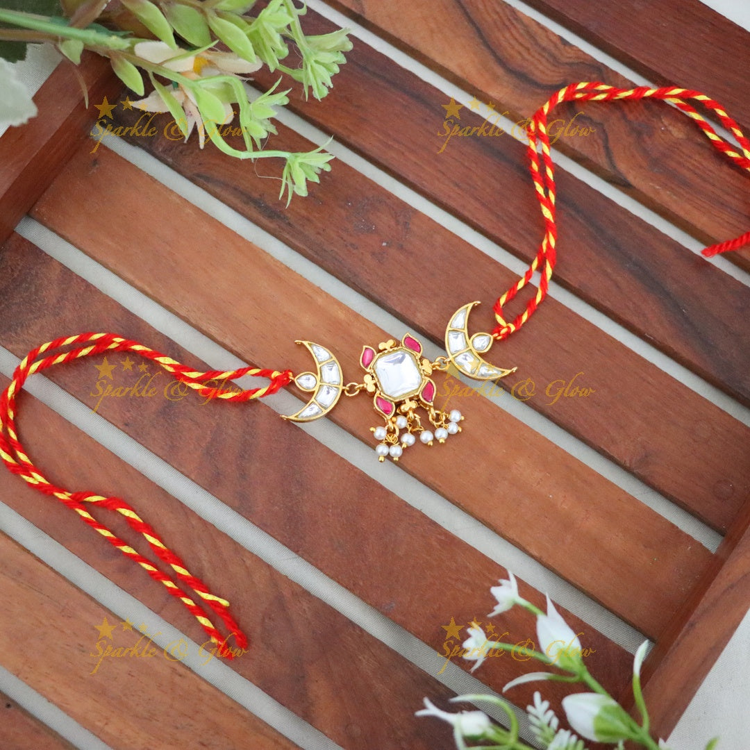 Elegant Rakhi with Gold Accents & Intricate Design