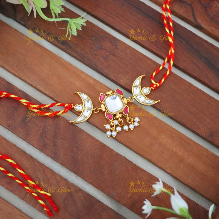 Elegant Rakhi with Gold Accents & Intricate Design