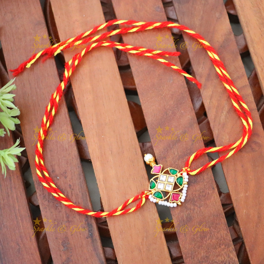Elegant Rakhi in Gold Finish for Celebrations