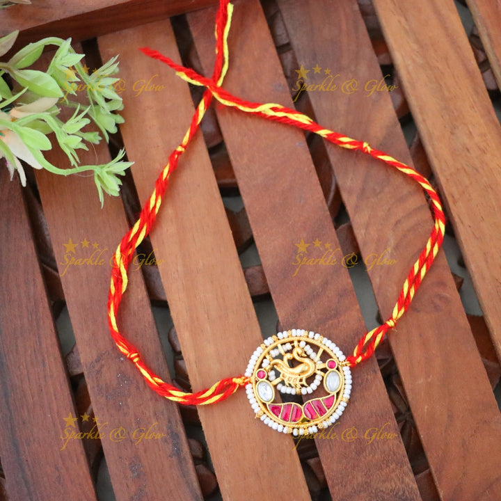 Exquisite Ganesh Rakhi with Gold Accents