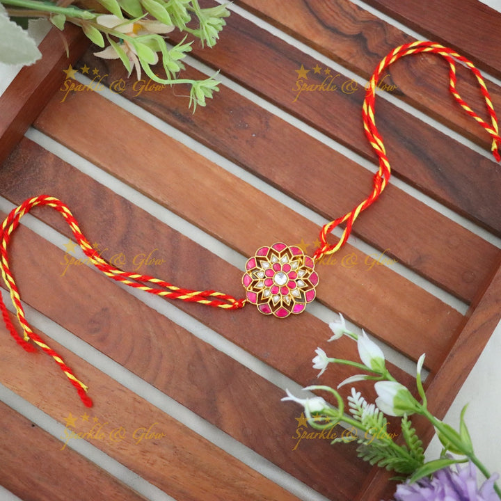 Exquisite Gold Floral Rakhi For Festive Elegance