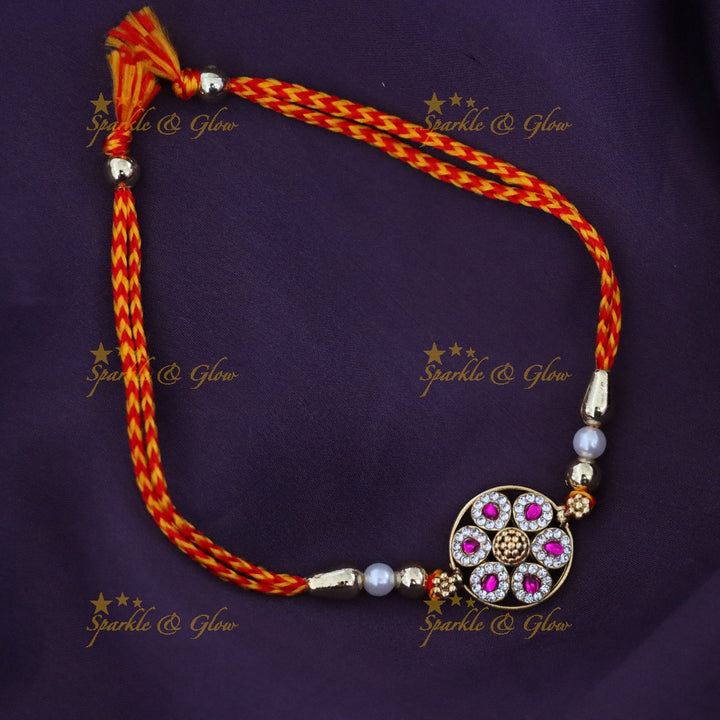 Elegant Gold-tone Rakhi with Pearls & Pink Stones