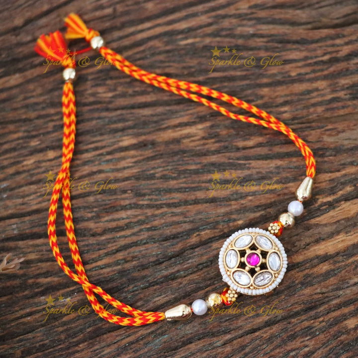 Exquisite Gold-Plated Pearl Rakhi for Festive Elegance