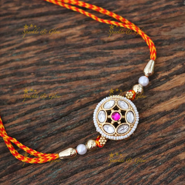 Exquisite Gold-Plated Pearl Rakhi for Festive Elegance