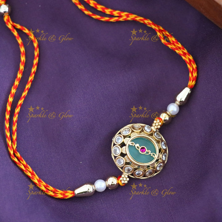 Exquisite Rakhi with Intricate Golden Detailing