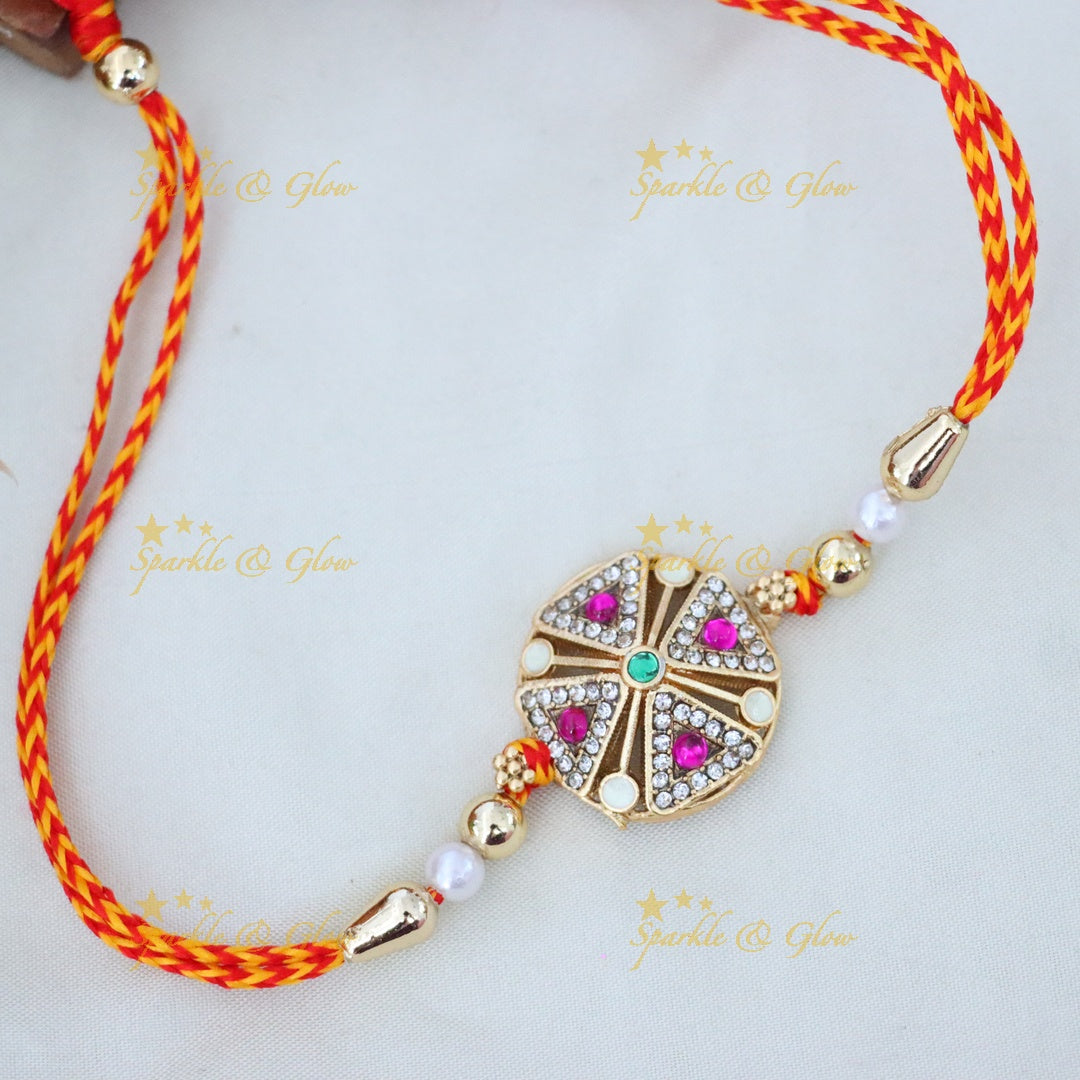 Elegant Gold-Toned Rakhi with Swarovski Crystals