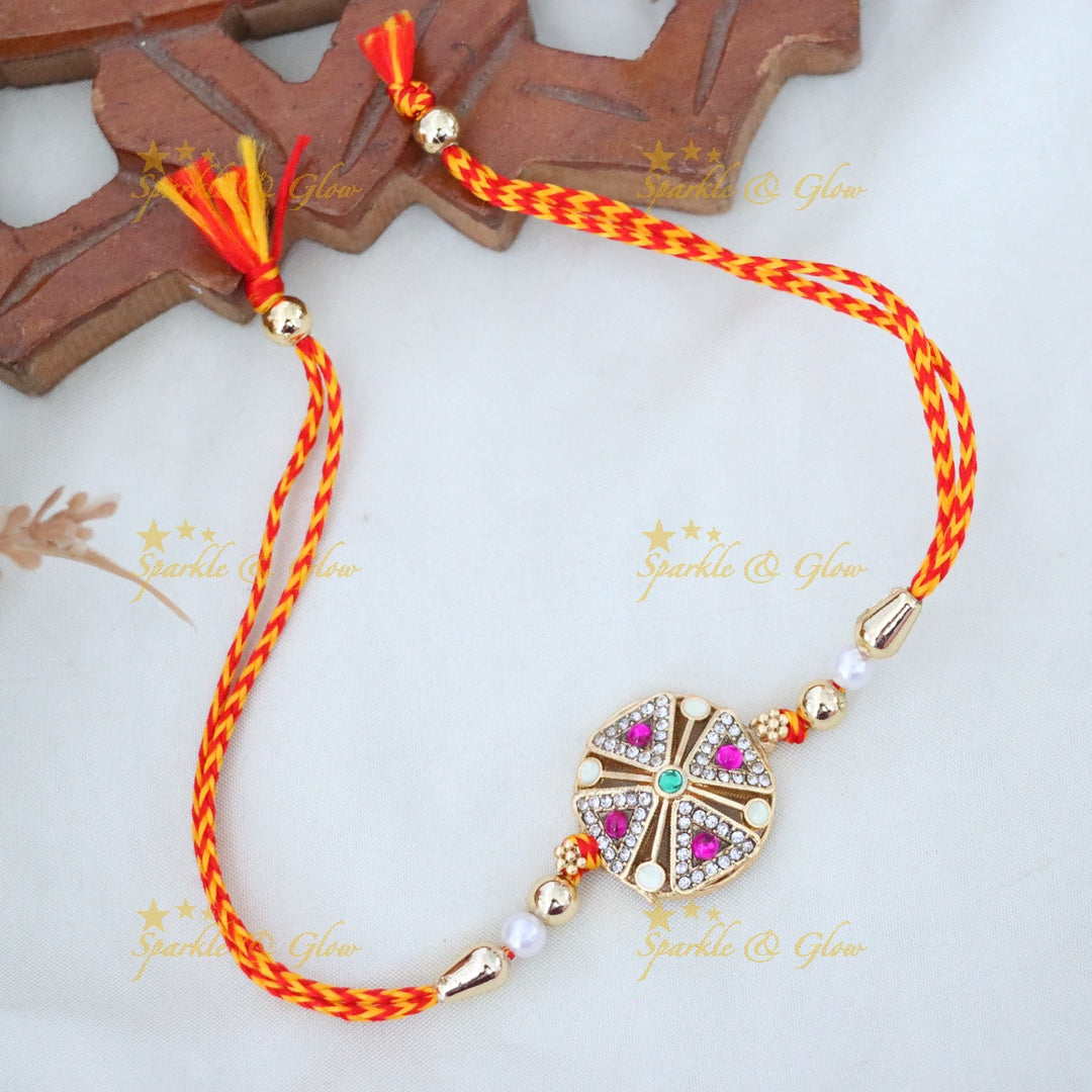 Elegant Gold-Toned Rakhi with Swarovski Crystals
