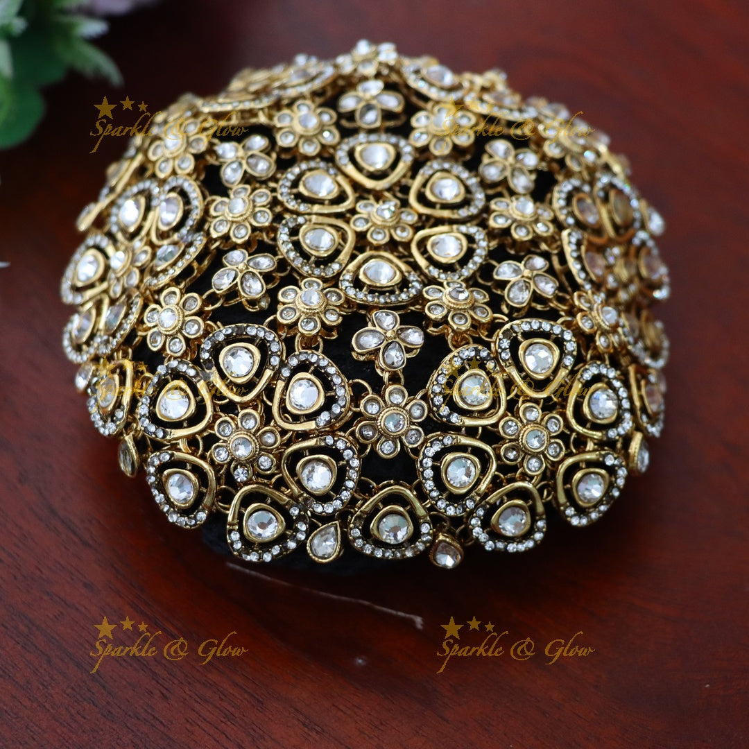 Luxurious Gold Floral Hair Bun for Festive Weddings